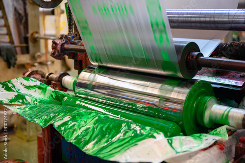 Obraz na płótnie Gravure plastic bag printing machines are working at a high speed to print images with color in the factory. w salonie