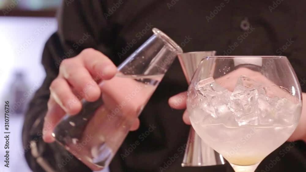 Measuring Water Mix With a Jigger Cup Measuring Water Mix With a Jigger Cup