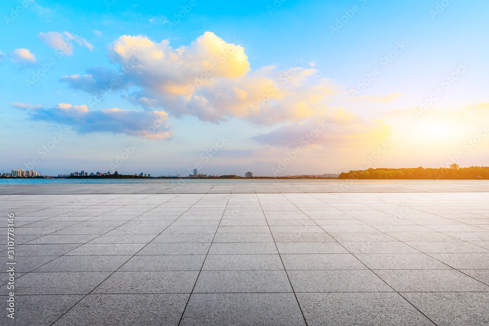 Suzhou city skyline and empty square floor landscape at sunset.