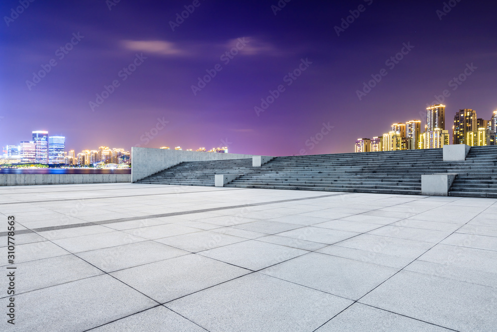 Suzhou city skyline and empty square floor landscape at night.