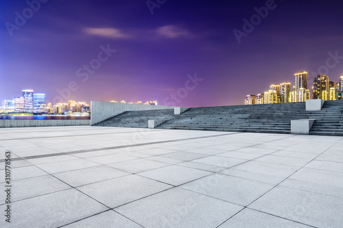 Suzhou city skyline and empty square floor landscape at night.