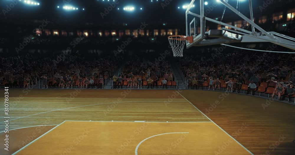 4k video of an empty professional basketball stadium with a crowd made in 3d and animated.