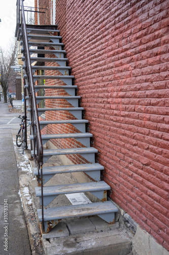 stairs red brick wall