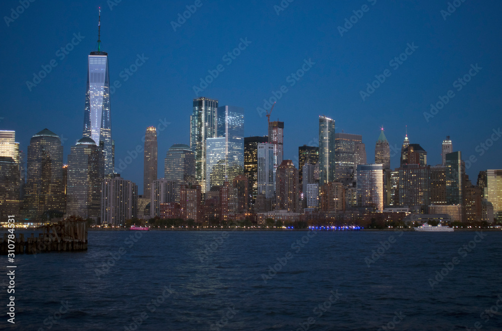 Nighttime view of the waterways of lower Manhattan and the World Financial Center from Liberty State Park in Jersey City, New Jersey -02