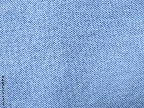 Denim background texture for design. Canvas denim texture. Blue denim that can be used as background. Blue jeans texture for any background. Denim jeans texture.