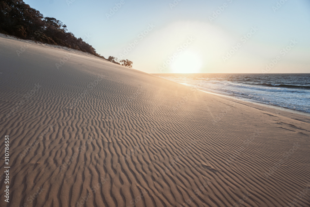 peaceful sunset on beach fraser island 