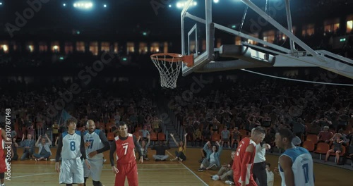 Wallpaper Mural Basketball players on big professional arena during the game. Tense moment of the game. Celebration Torontodigital.ca