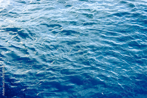 Fototapeta Naklejka Na Ścianę i Meble -  Blue sea wave close up, low angle view for summer background.