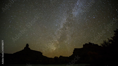Galaxy in the sky from Swasey's Beach looking towards Gunnison Butte in Utah.
