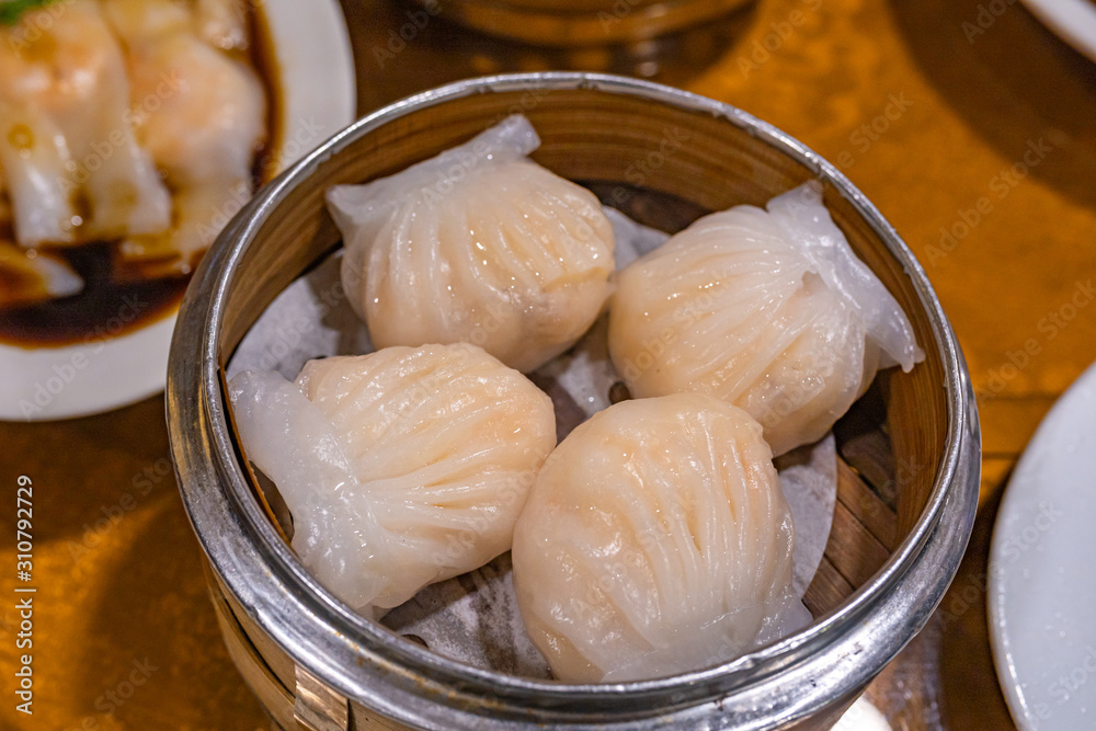 Crystal shrimp dumpling- xia jiao in bamboo dimsum steamer box Crystal shrimp dumpling- xia jiao in bamboo dimsum steamer box