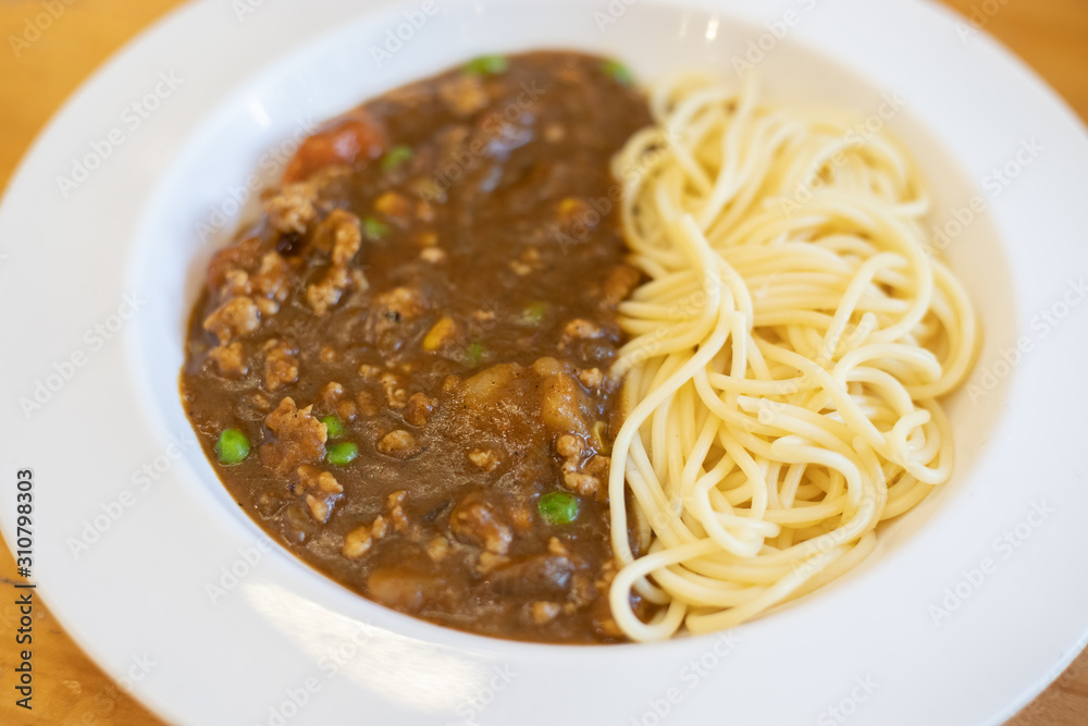 Curry Spaghetti in a White Plate. Curry Spaghetti in a White Plate.