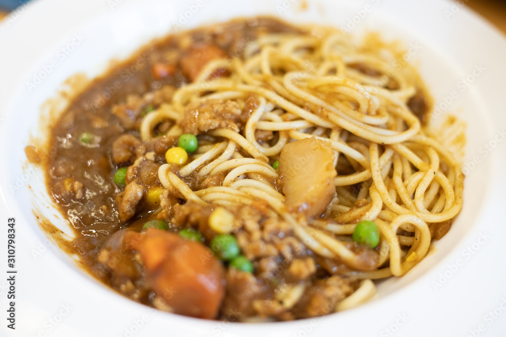 Curry Spaghetti in a White Plate. Curry Spaghetti in a White Plate.