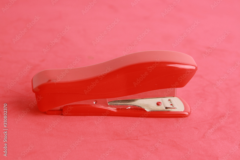 red stapler in color background red stapler in color background