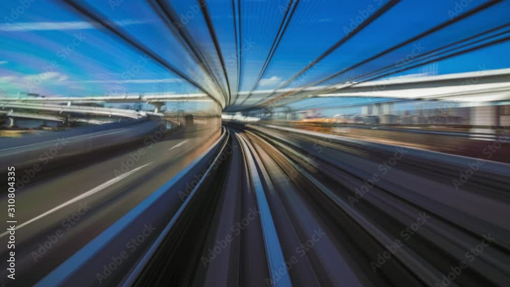 4K Timelapse of moving train at sunset, Tokyo, Japan