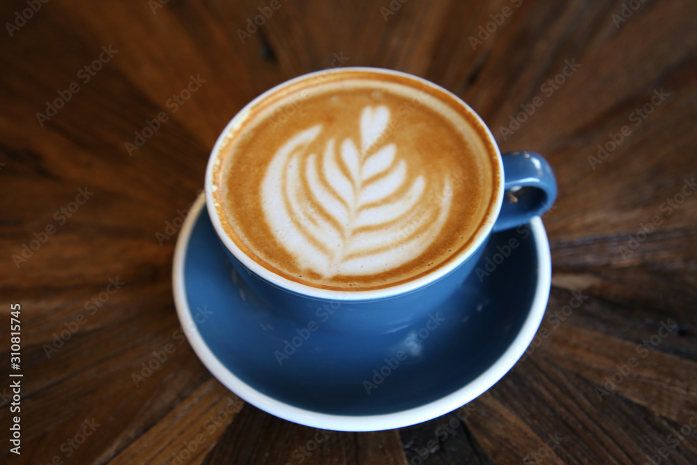 Cup of coffee latte art with coffee shop. Cup of coffee latte art with coffee shop.