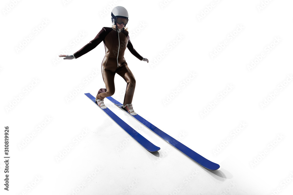 Jumping skier isolated on white.