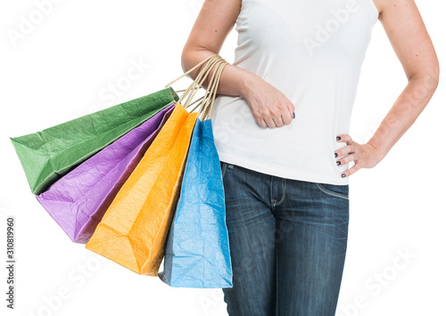 Woman posing with  shopping bags on a white background