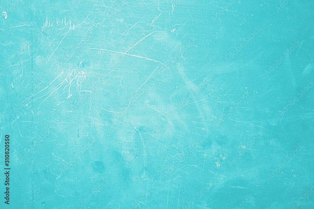 The blue background of the scratched metal plate is beautiful. The blue background of the scratched metal plate is beautiful.