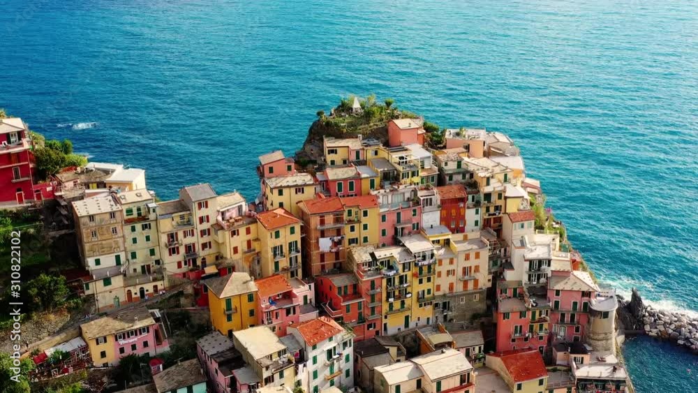 Village of Manarola in aerial view, Cinque Terre coast of Italy. Manarola is a small town in the province of La Spezia, in Liguria, in northern Italy and one of the Cinque Terre attractions for touris