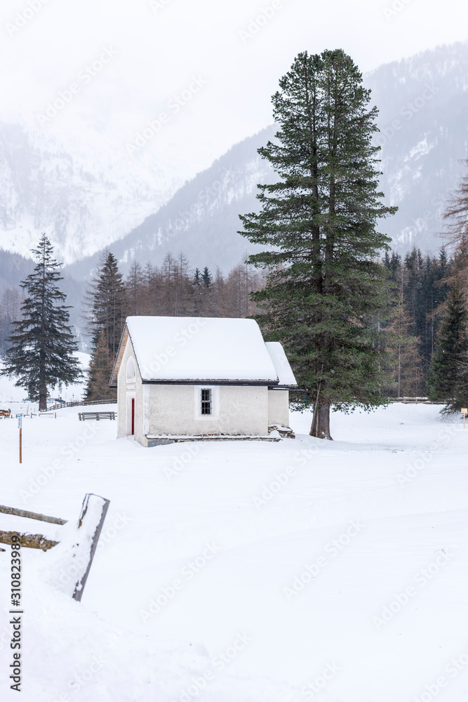 Waiting for the storm. Winter setting in Riva di Tures. Italy