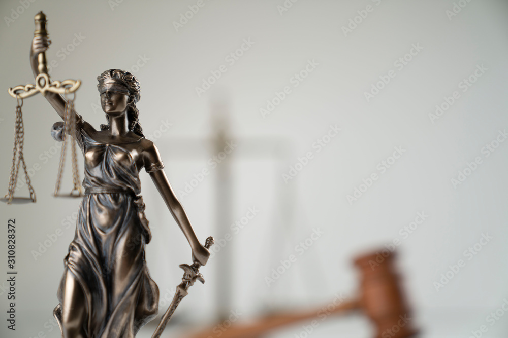 Law symbol composition. Gavel of the judge, Themis statue and scale of justice on off-white background. Law symbol composition. Gavel of the judge, Themis statue and scale of justice on off-white background.