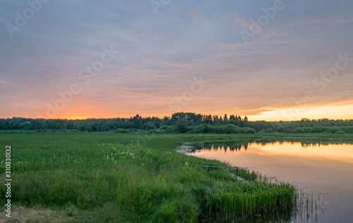 Summer colorful landscape - sunset and river