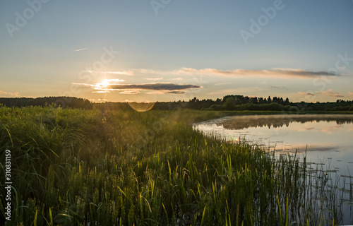 Summer colorful landscape - sunset and river