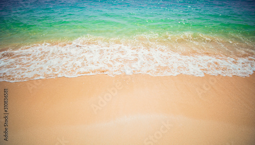 Soft Wave Of Blue Ocean On Sandy Beach. Background. 