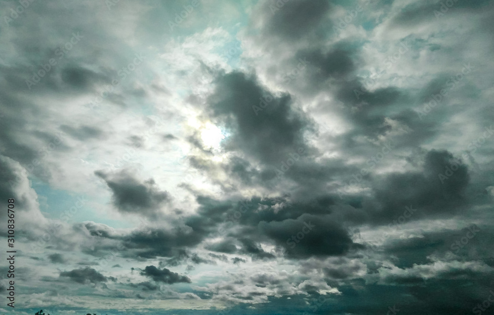 blue sky with clouds, dark weather conditions blue sky with clouds, dark weather conditions