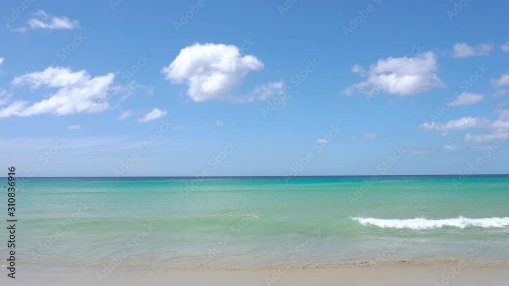Phuket beach sea, View of beach sea on sun light in the summer. At Karon Beach, Phuket, Thailand. 4K UHD, Video Clip. Phuket beach sea, View of beach sea on sun light in the summer. At Karon Beach, Phuket, Thailand. 4K UHD, Video Clip.