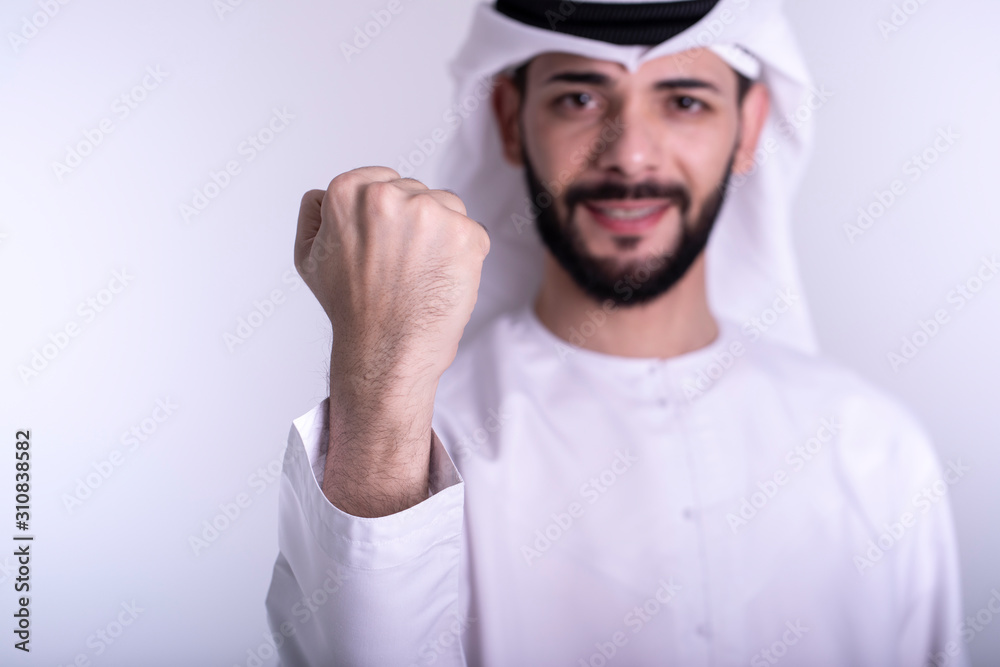 Exited Arab man showing Yes sign with hand - success concept Exited Arab man showing Yes sign with hand - success concept