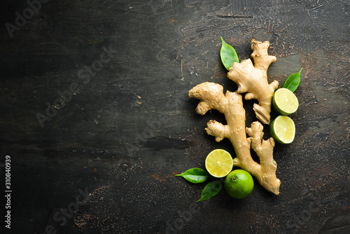 Fresh lime and ginger root. Vitamins. Top view. Free space for your text. photo