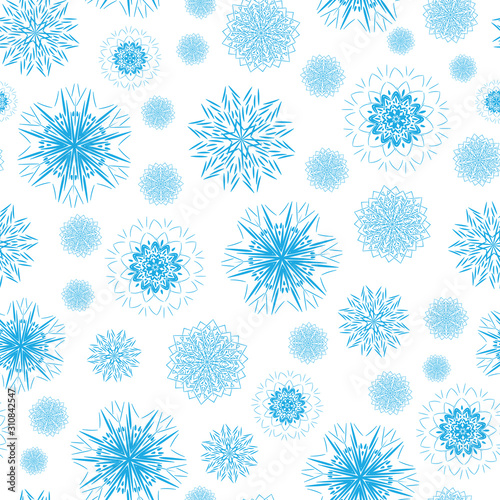 A seamless vector pattern with blue snowflake shaped mandalas on a white background. Winter themed surface print design. Great for fabrics, stationery, and wrapping paper.