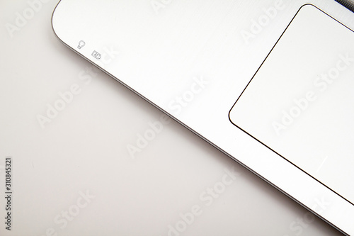 steel gray laptop touchpad on a white background