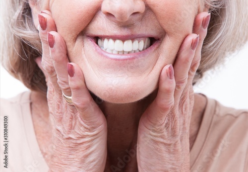 Close up view on senior dentures photo