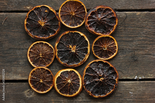 Dried Orange Slices Chips Dehydrated Crispy Citrus Group of Sun Dried Crunchy Oranges Healthy Snack Top view Flat Lay Brown Background