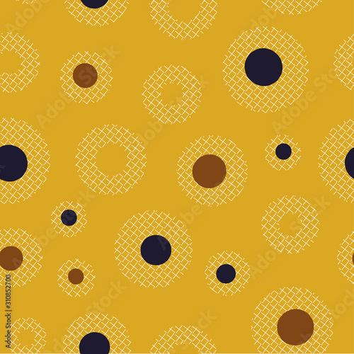 A seamless vector pattern with polka dots on mustard yellow background. Surface print design.