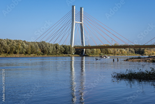 View from the laft bank of River Vistula on Siekierkowski Bridge in Warsaw city, Poland © Fotokon