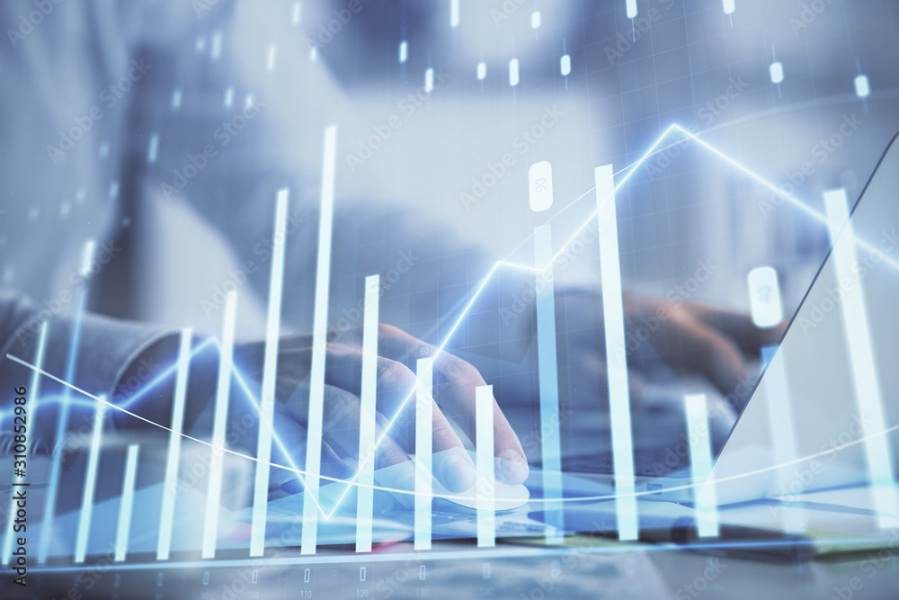 Double exposure of forex graph with man working on computer on background. Concept of market analysis. Double exposure of forex graph with man working on computer on background. Concept of market analysis.