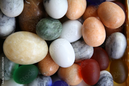 Background of onyx stone eggs of different colors