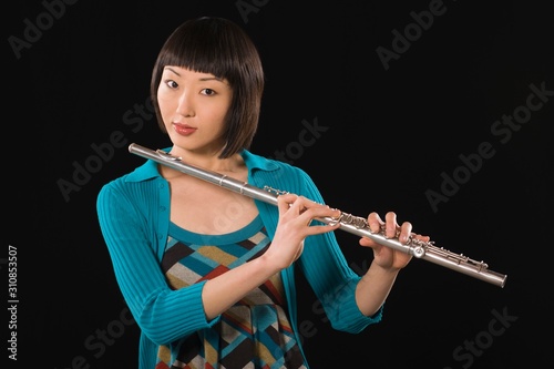 Woman Playing Flute