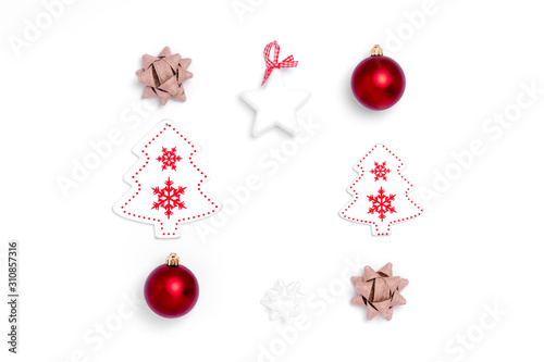 New Year and Christmas composition from red balls, white stars, chrismas tree, deer on white paper background. Top view, flat lay, copy space, square, instagram, from above