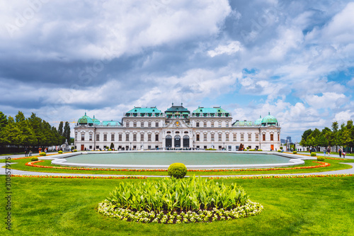 Belvedere palace Vienna Austria with spring flowers and cloudscape