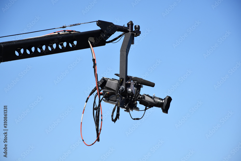 Overhead video camera crane with sky background Overhead video camera crane with sky background