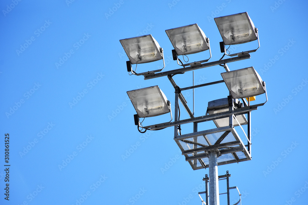 Sports stadium lights, floodlight with clear sky background