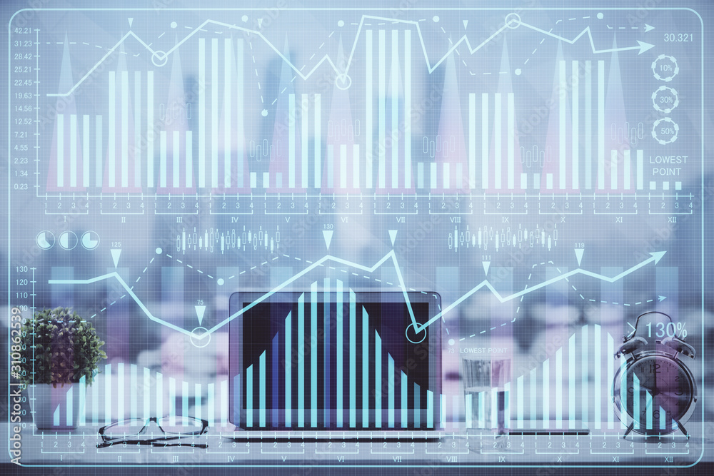 Forex market graph hologram and personal computer on background. Multi exposure. Concept of investment. Forex market graph hologram and personal computer on background. Multi exposure. Concept of investment.