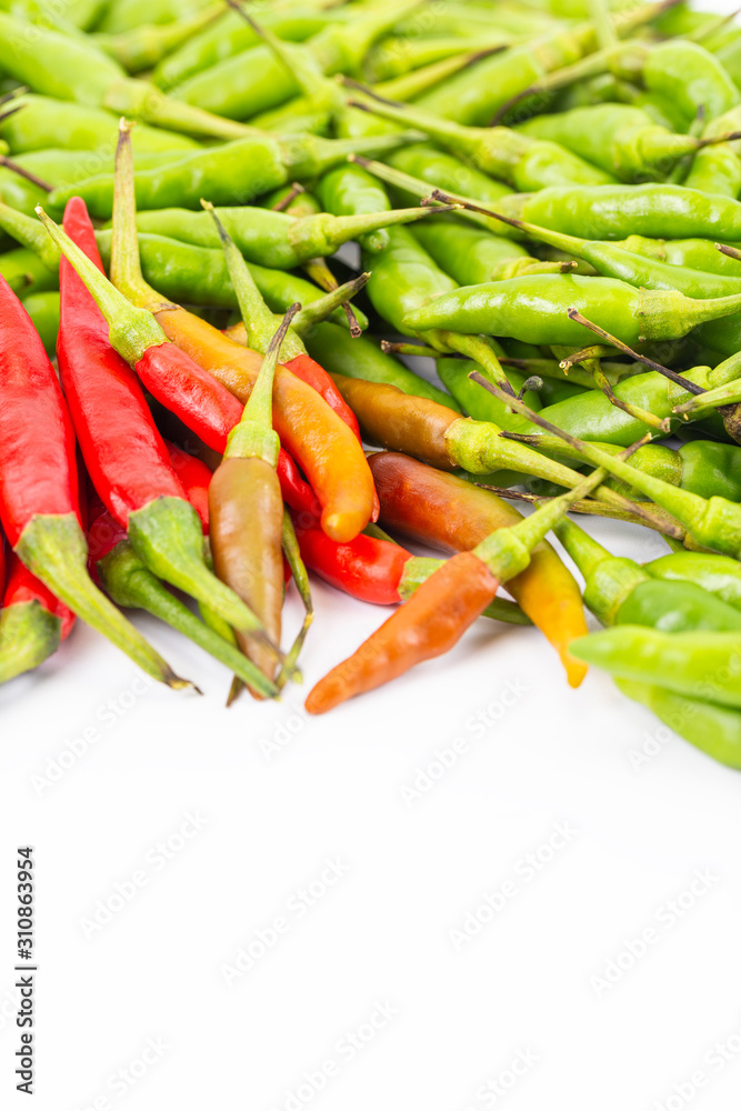 A set of fresh hot and spicy red and green bird-chilli on white space