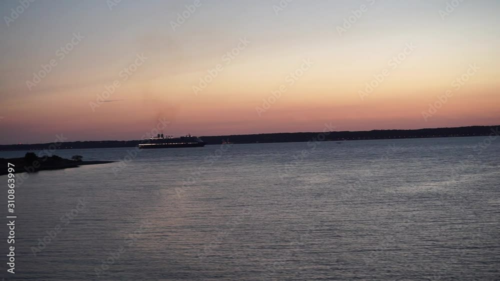 Cruise ship in front of a beautiful sunrise Cruise ship in front of a beautiful sunrise