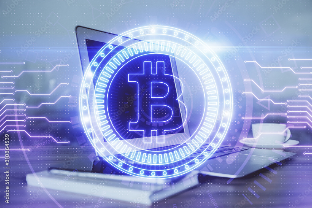 Multi exposure of blockchain theme hologram and table with computer background. Concept of bitcoin crypto currency. Multi exposure of blockchain theme hologram and table with computer background. Concept of bitcoin crypto currency.
