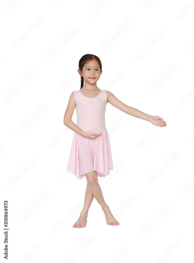 Adorable little girl practicing her ballet isolated on white background. Children is studying ballet. Adorable little girl practicing her ballet isolated on white background. Children is studying ballet.